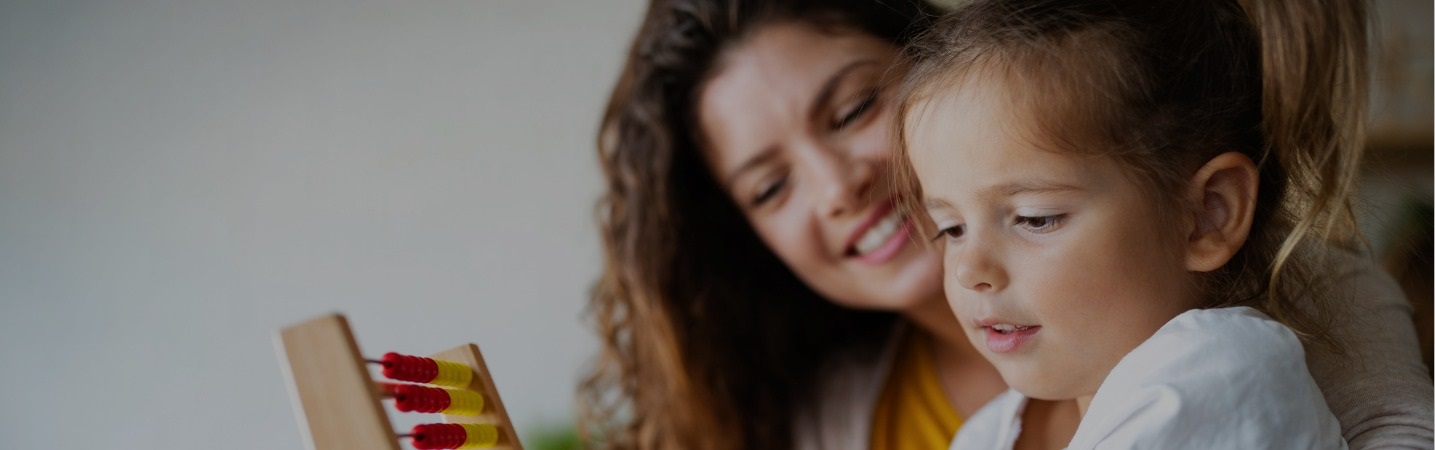 mother and daughter with an abacus