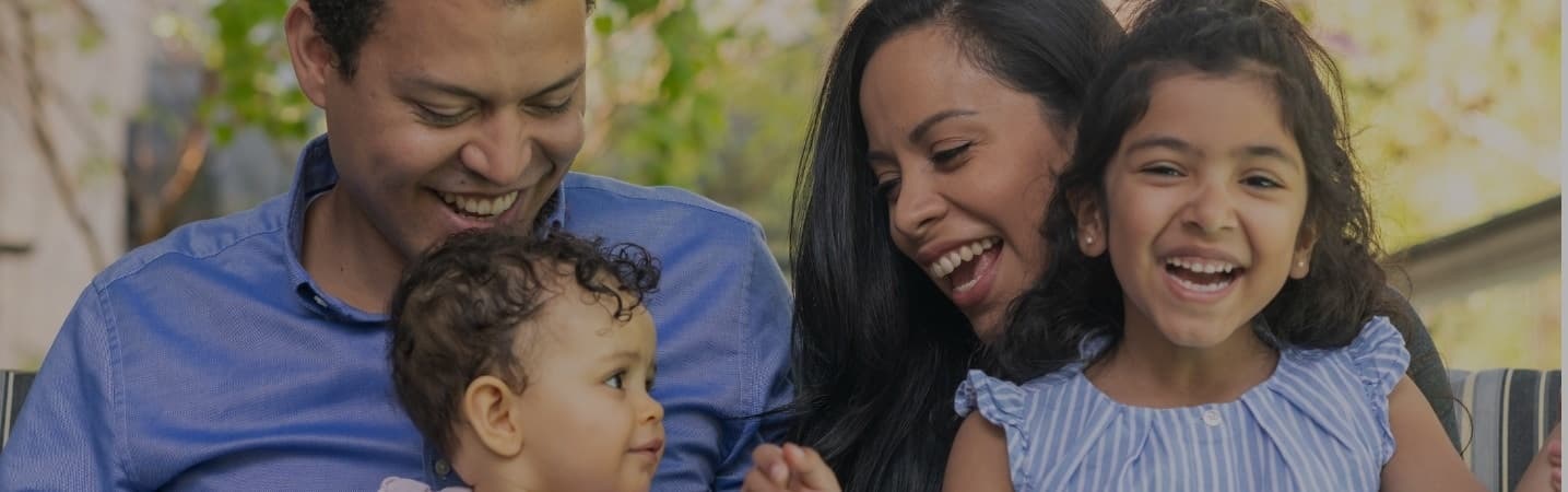 Happy latin american family outdoors
