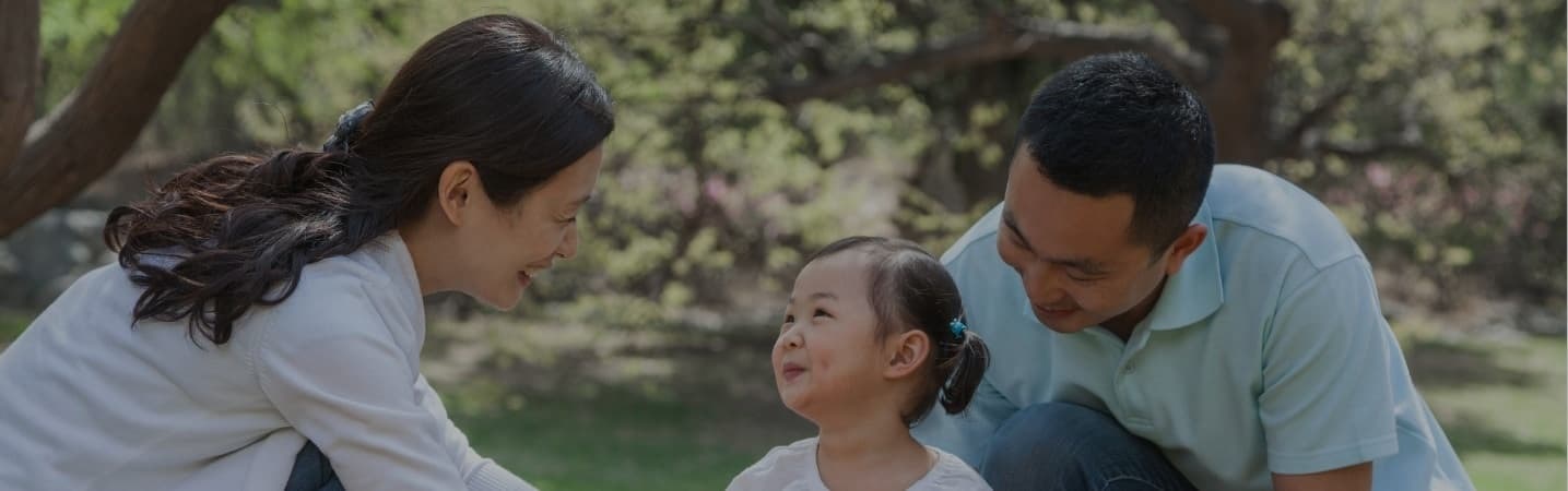 Young Asian Family having a picnic