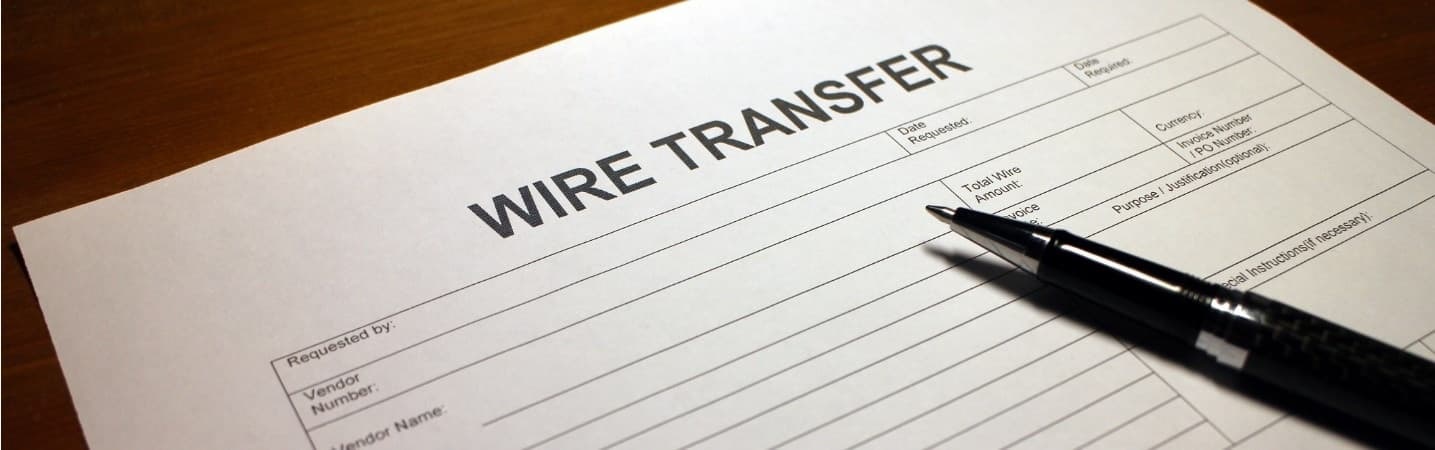 Wire Transfer form and pen