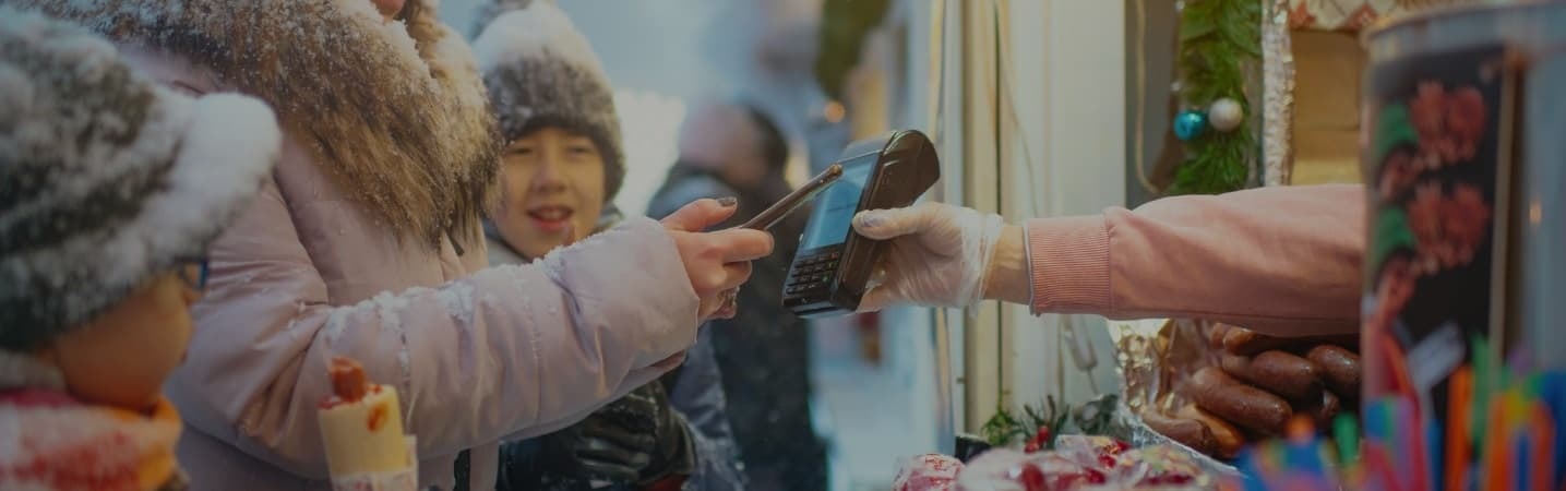 family shopping at outdoor market